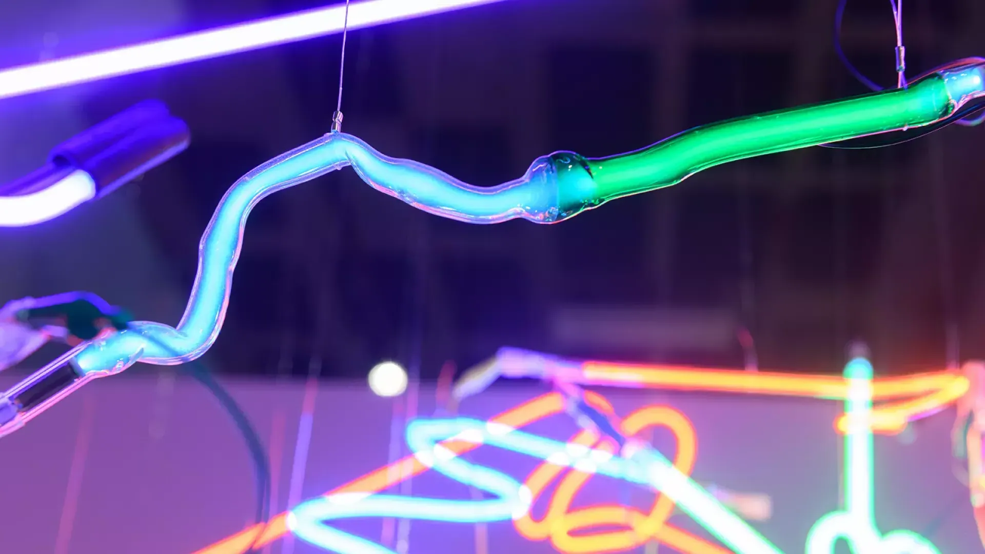 Neon artworks shine as part of "She Bends: Neon as Soulcraft" at the Museum of Craft and Design