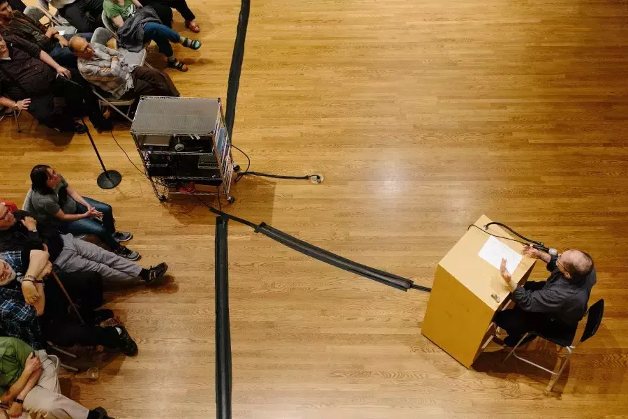 Overhead shot of Dennis McNally giving a talk